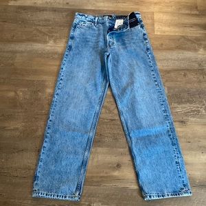 NWT mid-rise loose straight leg jeans.